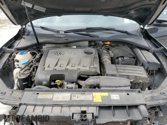 2014 Volkswagen Passat SEL Premium with VIN 1VWCN7A30EC036693, listed as a Copart auction lot 59156245 with 136,939 mi miles and Salvage title. Bid and sale history available at DreamBid. Image 12.