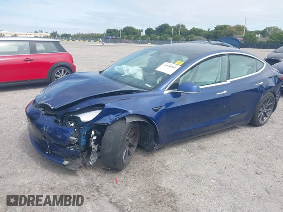 2020 Tesla Model 3 Standard Range Plus with VIN 5YJ3E1EA7LF785838, listed as a IAAI auction lot 41586081 with 38,392 mi miles and . Bid and sale history available at carsss.com. Image 17.