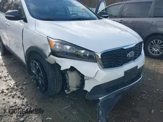 2019 Kia Sorento LX with VIN 5XYPG4A54KG599963, listed as a IAAI auction lot 41558055 with 119,238 mi miles and . Bid and sale history available at DreamBid. Image 6.