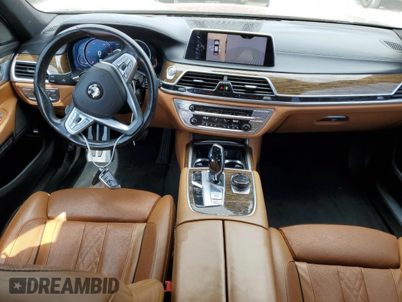 2016 BMW 7 Series 750i with VIN WBA7F0C53GGM20760, listed as a Copart auction lot 57230334 with 77,588 mi miles and Salvage Title. Bid and sale history available at carsss.com. Image 8.