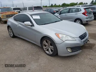 2011 Hyundai Genesis Coupe Grand Touring z VIN KMHHU6KH2BU052279, wystawiony jako IAAI lot #42058571 z przebiegiem 334 900 mil mil oraz . Historia ofert i sprzedaży dostępna na DreamBid. Obrazek 1.
