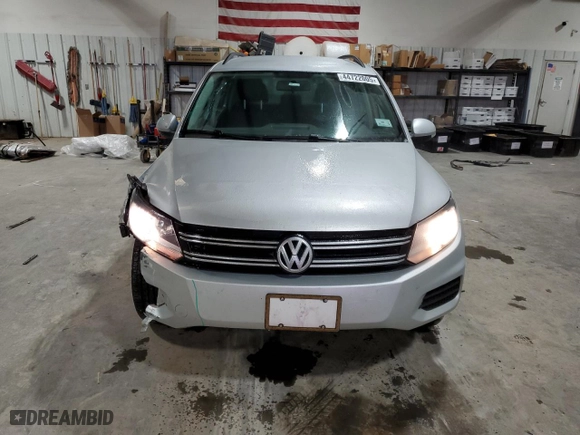 2015 Volkswagen Tiguan S with VIN WVGAV7AXXFW592518, listed as a Copart auction lot 44722005 with 123,810 mi miles and Salvage Title. Bid and sale history available at carsss.com. Image 5.