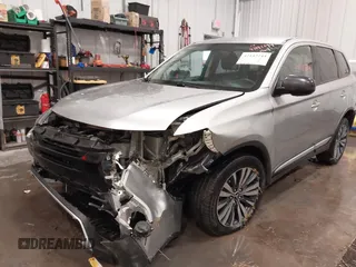 2020 Mitsubishi Outlander ES z VIN JA4AZ3A38LZ018227, wystawiony jako IAAI lot #42142244 z przebiegiem 91 342 mil mil oraz . Historia ofert i sprzedaży dostępna na DreamBid. Obrazek 6.