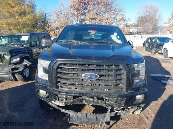 2017 Ford F-150 XL with VIN 1FTFW1EF9HFB56087, listed as a IAAI auction lot 41645257 with 165,578 mi miles. Bid and sale history available at carsss.com. Image 12.