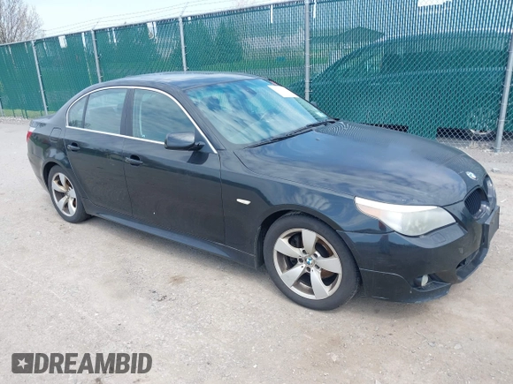 2007 BMW 5 Series 530i with VIN WBANE73597CM56897, listed as a IAAI auction lot 42113113 with 212,774 mi miles. Bid and sale history available at carsss.com. Image 1.