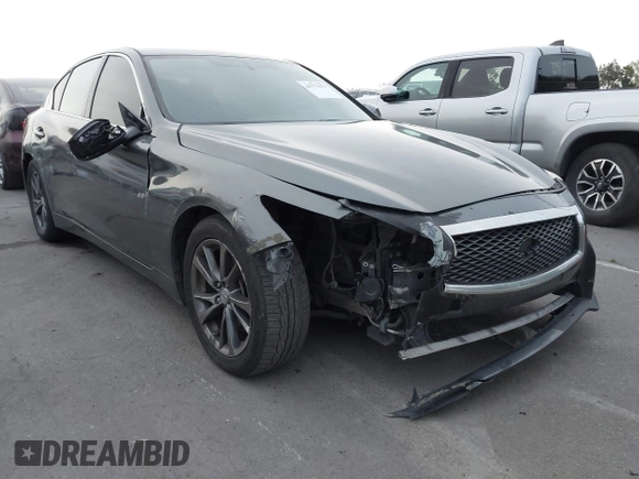 2015 Infiniti Q50 Premium with VIN JN1BV7AP1FM355875, listed as a IAAI auction lot 41777679 with 100,827 mi miles. Bid and sale history available at carsss.com. Image 1.