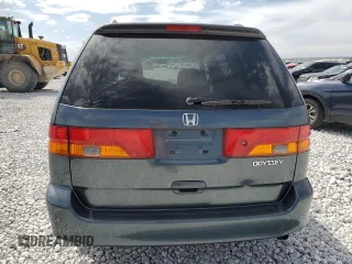 2003 Honda Odyssey EX-L z VIN 5FNRL18943B020961, wystawiony jako Copart lot #86009874 z przebiegiem 155 993 mil mil oraz Szkoda całkowita • Salvage title. Historia ofert i sprzedaży dostępna na DreamBid. Obrazek 6.