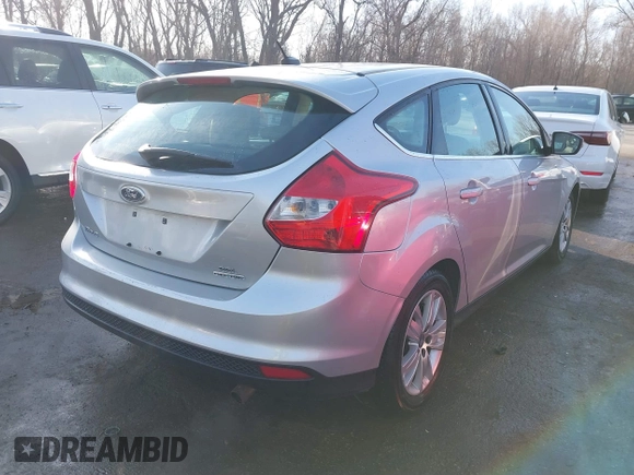 2012 Ford Focus SEL with VIN 1FAHP3M22CL413512, listed as a IAAI auction lot 41758125 with 161,857 mi miles. Bid and sale history available at carsss.com. Image 4.