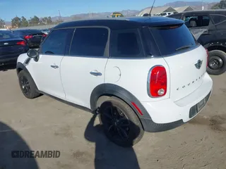 2014 MINI Countryman with VIN WMWZB3C59EWR40065, listed as a IAAI auction lot 40838816 with 80,000 mi miles and . Bid and sale history available at DreamBid. Image 3.