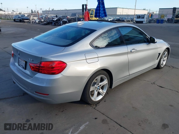 2015 BMW 4 Series 428i with VIN WBA3N7C52FK222743, listed as a IAAI auction lot 41602525 with 81,661 mi miles and . Bid and sale history available at DreamBid. Image 4.