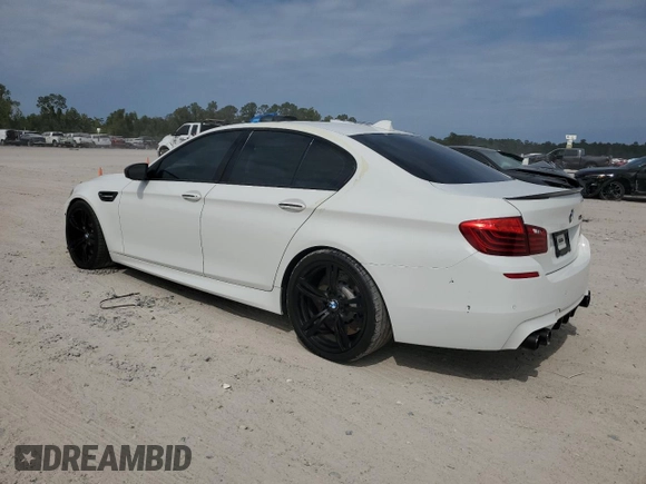 2016 BMW M5 with VIN WBSFV9C59GD595692, listed as a Copart auction lot 74151434 with 55,092 mi miles and Salvage Title. Bid and sale history available at carsss.com. Image 2.