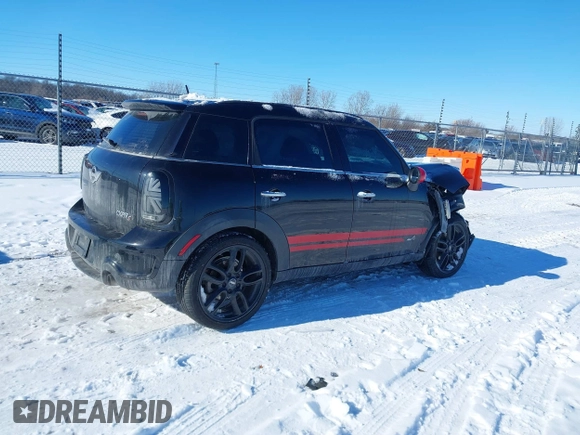 2011 MINI Countryman S with VIN WMWZC5C50BWL55234, listed as a IAAI auction lot 41323339 with 134,709 mi miles and . Bid and sale history available at DreamBid. Image 4.