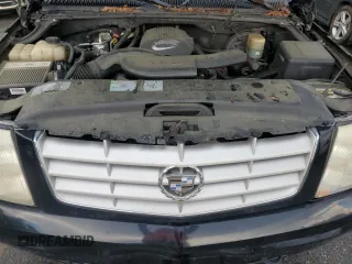 2002 Cadillac Escalade z VIN 1GYEC63T02R217174, wystawiony jako Copart lot #60339985 z przebiegiem 229 326 mil mil oraz Czysty tytuł • Clean title. Historia ofert i sprzedaży dostępna na DreamBid. Obrazek 11.