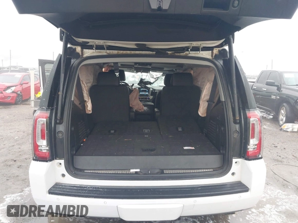 2018 GMC Yukon SLT with VIN 1GKS1BKC8JR392851, listed as a IAAI auction lot 40744741 with 117,028 mi miles. Bid and sale history available at carsss.com. Image 8.