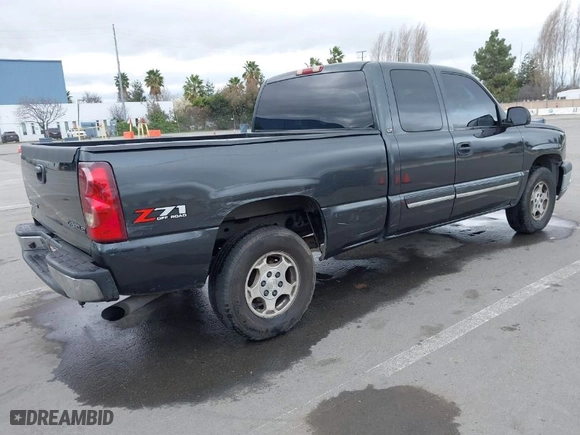 2003 Chevrolet Silverado 1500 LS with VIN 1GCEK19TX3E107860, listed as a IAAI auction lot 41461401 with 379,055 mi miles. Bid and sale history available at carsss.com. Image 4.