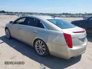 2016 Cadillac XTS Luxury Collection with VIN 2G61M5S32G9101153, listed as a IAAI auction lot 42523917 with 131,054 mi miles and . Bid and sale history available at DreamBid. Image 3.
