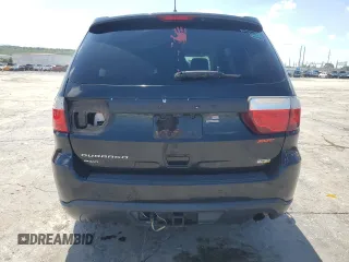 2013 Dodge Durango SXT with VIN 1C4RDJAG3DC575923, listed as a Copart auction lot 60100195 with 211,606 mi miles and Salvage title. Bid and sale history available at DreamBid. Image 6.