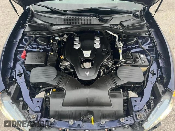 2015 Maserati Ghibli z VIN ZAM57XSA2F1159438, wystawiony jako Copart lot #49187735 z przebiegiem 73 996 mil mil oraz Szkoda całkowita • Salvage title. Historia ofert i sprzedaży dostępna na DreamBid. Obrazek 9.