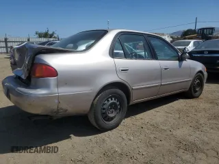 1998 Toyota Corolla VE with VIN 1NXBR18E6WZ080700, listed as a Copart auction lot 58605135 with 214,928 mi miles and Salvage title. Bid and sale history available at DreamBid. Image 3.