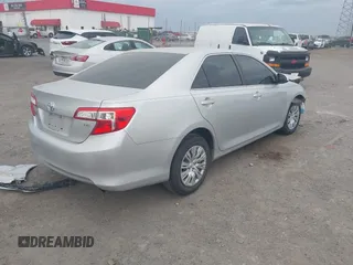 2014 Toyota Camry L with VIN 4T1BF1FK6EU346670, listed as a IAAI auction lot 41942544 with 140,438 mi miles and . Bid and sale history available at DreamBid. Image 4.
