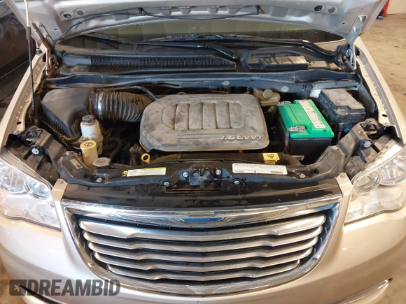 2012 Chrysler Town & Country Touring with VIN 2C4RC1BG3CR363854, listed as a IAAI auction lot 41733016 with 76,869 mi miles. Bid and sale history available at carsss.com. Image 10.
