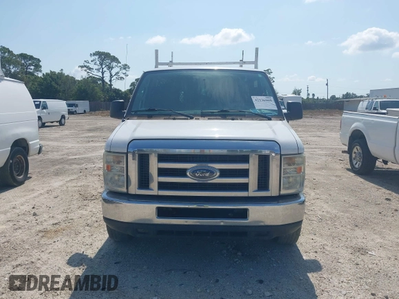 2013 Ford Econoline Cargo Commercial z VIN 1FTNE2EW4DDA25532, wystawiony jako IAAI lot #42136969 z przebiegiem 228 446 mil mil oraz . Historia ofert i sprzedaży dostępna na DreamBid. Obrazek 12.
