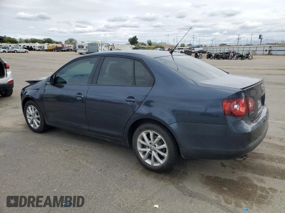 2010 Volkswagen Jetta Limited Edition with VIN 3VWRZ7AJ0AM099928, listed as a Copart auction lot 57291895 with 118,451 mi miles and Salvage title. Bid and sale history available at DreamBid. Image 2.