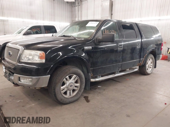 2004 Ford F-150 XLT with VIN 1FTPW14554KC20463, listed as a IAAI auction lot 41862699 with 204,126 mi miles. Bid and sale history available at carsss.com. Image 2.