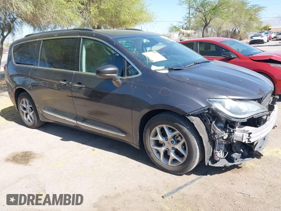 2017 Chrysler Pacifica Touring L with VIN 2C4RC1BG0HR826881, listed as a IAAI auction lot 42171240 with 214,188 mi miles and . Bid and sale history available at DreamBid. Image 1.