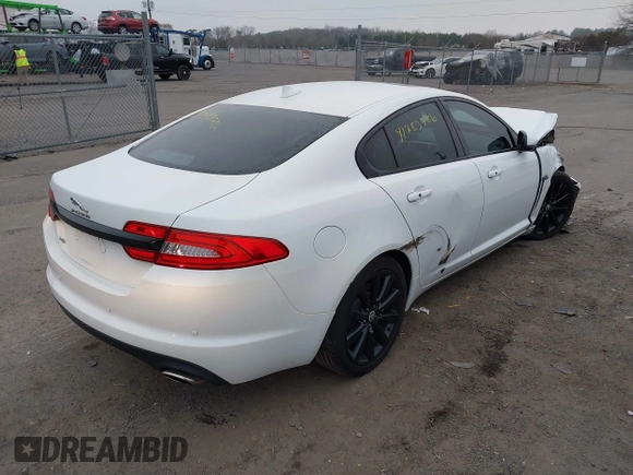 2014 Jaguar XF SC with VIN SAJWA0EX0E8U09381, listed as a IAAI auction lot 41783386 with 27,730 mi miles and . Bid and sale history available at DreamBid. Image 4.