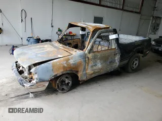 1996 Ford Ranger XL z VIN 1FTCR10A3TPB51735, wystawiony jako Copart lot #55229865 z przebiegiem Nie podano mil oraz Szkoda całkowita • Salvage title. Historia ofert i sprzedaży dostępna na DreamBid. Obrazek 1.