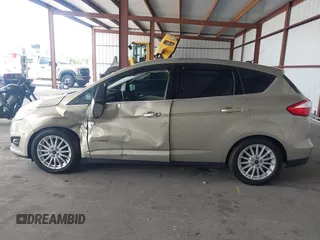 2016 Ford C-Max SEL z VIN 1FADP5BUXGL106531, wystawiony jako IAAI lot #42341433 z przebiegiem 74 854 mil mil oraz . Historia ofert i sprzedaży dostępna na DreamBid. Obrazek 14.
