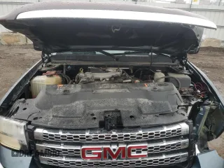 2013 GMC Sierra 2500HD SLT with VIN 1GT121E82DF212436, listed as a Copart auction lot 80863174 with 209,280 mi miles and Salvage title. Bid and sale history available at DreamBid. Image 11.