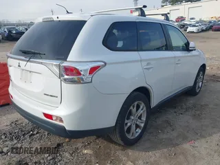 2014 Mitsubishi Outlander SE z VIN JA4AZ3A3XEZ012593, wystawiony jako IAAI lot #41750923 z przebiegiem 187 182 mil mil oraz . Historia ofert i sprzedaży dostępna na DreamBid. Obrazek 4.