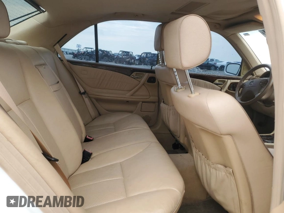 2001 Mercedes-Benz E-Class with VIN WDBJF70J51B332881, listed as a Copart auction lot 63487844 with 216,080 mi miles and Salvage Title. Bid and sale history available at carsss.com. Image 11.