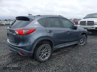 2013 Mazda CX-5 Sport with VIN JM3KE2BE7D0154040, listed as a IAAI auction lot 41842013 with 132,382 mi miles. Bid and sale history available at carsss.com. Image 4.