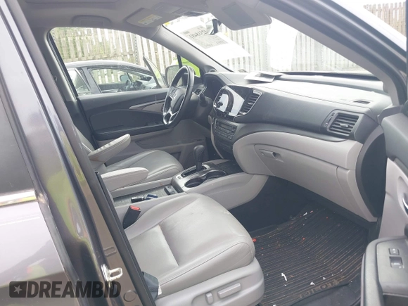 2019 Honda Pilot EX-L with VIN 5FNYF5H45KB018293, listed as a IAAI auction lot 42318481 with 76,617 mi miles and . Bid and sale history available at DreamBid. Image 5.