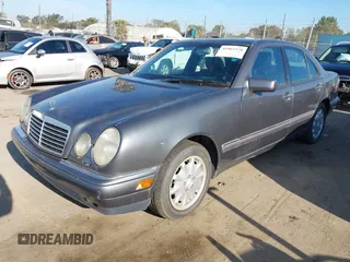 1997 Mercedes-Benz E 320 with VIN WDBJF55F7VA402305, listed as a IAAI auction lot 41865470 with 210,577 mi miles and . Bid and sale history available at DreamBid. Image 2.
