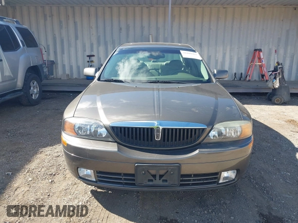 2002 Lincoln LS w/Base Pkg with VIN 1LNHM87A02Y706583, listed as a IAAI auction lot 41809363 with 131,313 mi miles. Bid and sale history available at carsss.com. Image 6.