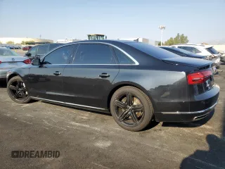 2015 Audi A8 3.0T с VIN WAU3GAFD2FN011129, выставлен на аукционе Copart как лот 64904045 с пробегом 147 549 миль миль и Чистый • Clean title. История ставок и продаж доступна на DreamBid. Изображение 2.