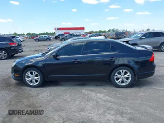 2012 Ford Fusion SE z VIN 3FAHP0HG8CR339020, wystawiony jako IAAI lot #41962046 z przebiegiem 136 072 mil mil oraz . Historia ofert i sprzedaży dostępna na DreamBid. Obrazek 14.