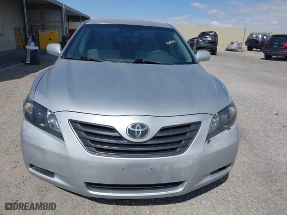 2007 Toyota Camry CE with VIN 4T1BE46K07U532647, listed as a IAAI auction lot 42075663 with 125,736 mi miles. Bid and sale history available at carsss.com. Image 6.