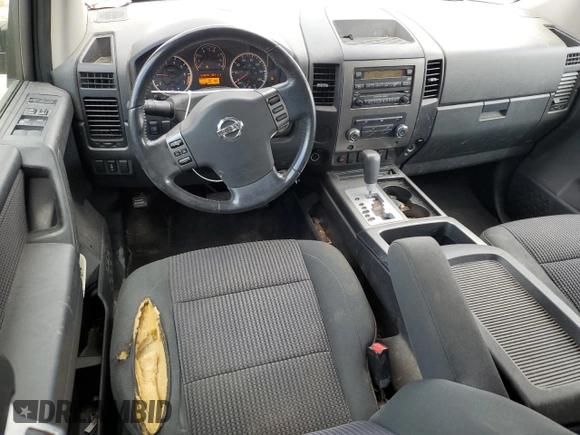 2010 Nissan Titan SE with VIN 1N6BA0ED2AN313022, listed as a Copart auction lot 51222275 with 137,640 mi miles and Salvage title. Bid and sale history available at DreamBid. Image 8.