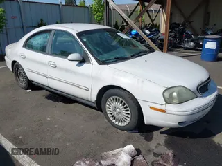 2002 Mercury Sable GS z VIN 1MEFM50U22G643733, wystawiony jako IAAI lot #42090195 z przebiegiem 119 940 mil mil oraz . Historia ofert i sprzedaży dostępna na DreamBid. Obrazek 1.
