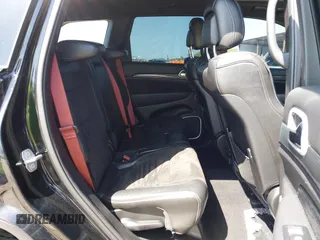 2020 Jeep Grand Cherokee Trackhawk with VIN 1C4RJFN96LC336561, listed as a IAAI auction lot 41991800 with 58,781 mi miles and . Bid and sale history available at DreamBid. Image 8.