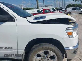 2022 Ram 1500 Big Horn z VIN 1C6RRFMG2NN430198, wystawiony jako IAAI lot #41944132 z przebiegiem 54 479 mil mil oraz . Historia ofert i sprzedaży dostępna na DreamBid. Obrazek 22.