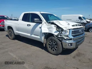 2014 Toyota Tundra SR with VIN 5TFRY5F1XEX157448, listed as a IAAI auction lot 42606024 with 150,626 mi miles and . Bid and sale history available at DreamBid. Image 1.