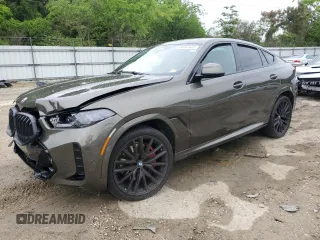 2025 BMW X6 xDrive40i z VIN 5UX33EX04S9Y86473, wystawiony jako Copart lot #56322405 z przebiegiem Nie podano mil oraz Szkoda całkowita • Salvage title. Historia ofert i sprzedaży dostępna na DreamBid. Obrazek 1.