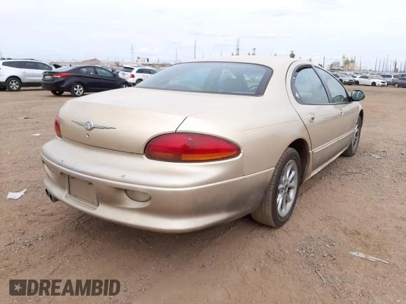 1999 Chrysler LHS z VIN 2C3HC56G0XH233303, wystawiony jako Copart lot #42642835 z przebiegiem 124 887 mil mil oraz Tytuł czysty. Historia ofert i sprzedaży dostępna na DreamBid. Obrazek 4.