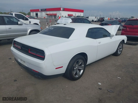 2017 Dodge Challenger SXT Plus with VIN 2C3CDZAG5HH658149, listed as a IAAI auction lot 41876762 with 128,126 mi miles. Bid and sale history available at carsss.com. Image 4.
